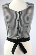 Load image into Gallery viewer, Close up of top, Top on mannequin, Pictured from the front, Sleeveless top, Stiped material, Black waist band that ties into a bow