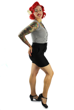Load image into Gallery viewer, Model wearing top with black high waisted shorts, Pictured from the side